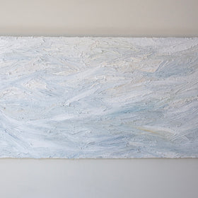 A white and light blue abstract painting with thick, impasto brushstrokes is hung on a gallery wall.